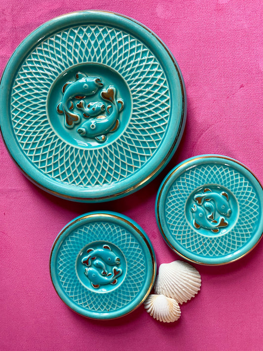 Ensemble turquoise de dessous de plat et dessous de bouteilles Art Déco