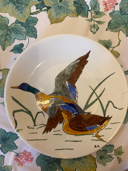 Paire d’assiettes Gien à décor d’oiseaux